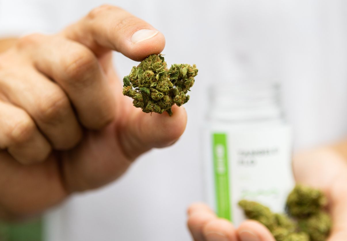Strains 1 Tangelo Flo Cannabis Jar with Pot Leaves